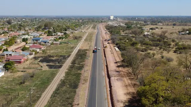 Drone view: stormwater line beside a town road